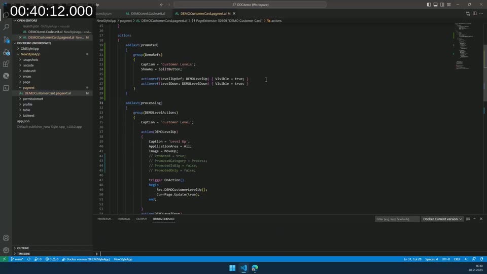 AL code in Visual Studio Code showing a promoted action group with actionref elements and ShowAs = SplitButton