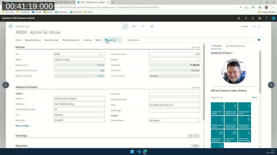 Business Central customer card showing the Level Up action promoted directly to the top of the action bar as a split button