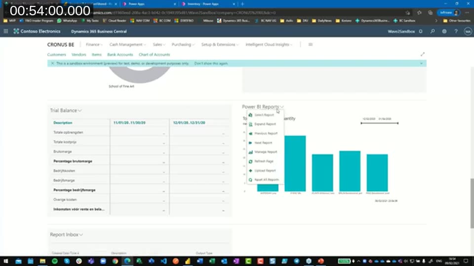 Business Central role center showing an embedded Power BI Reports part with a bar chart alongside a Trial Balance list